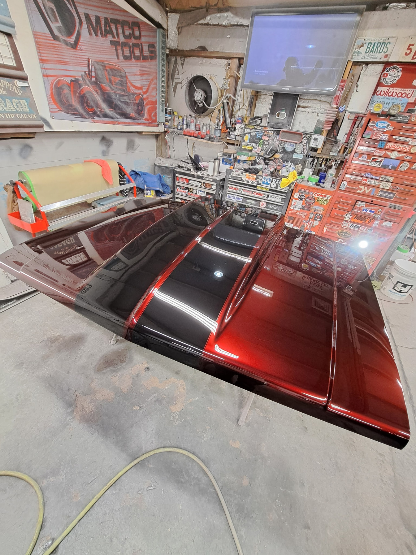Hood painted in candy red with black stripes